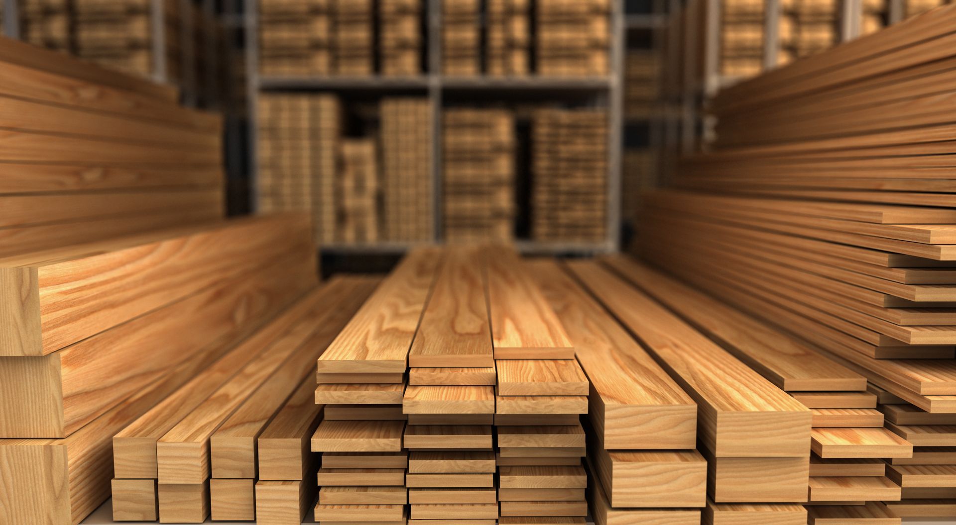 Stacked wooden planks neatly arranged in a lumber warehouse or storage facility.