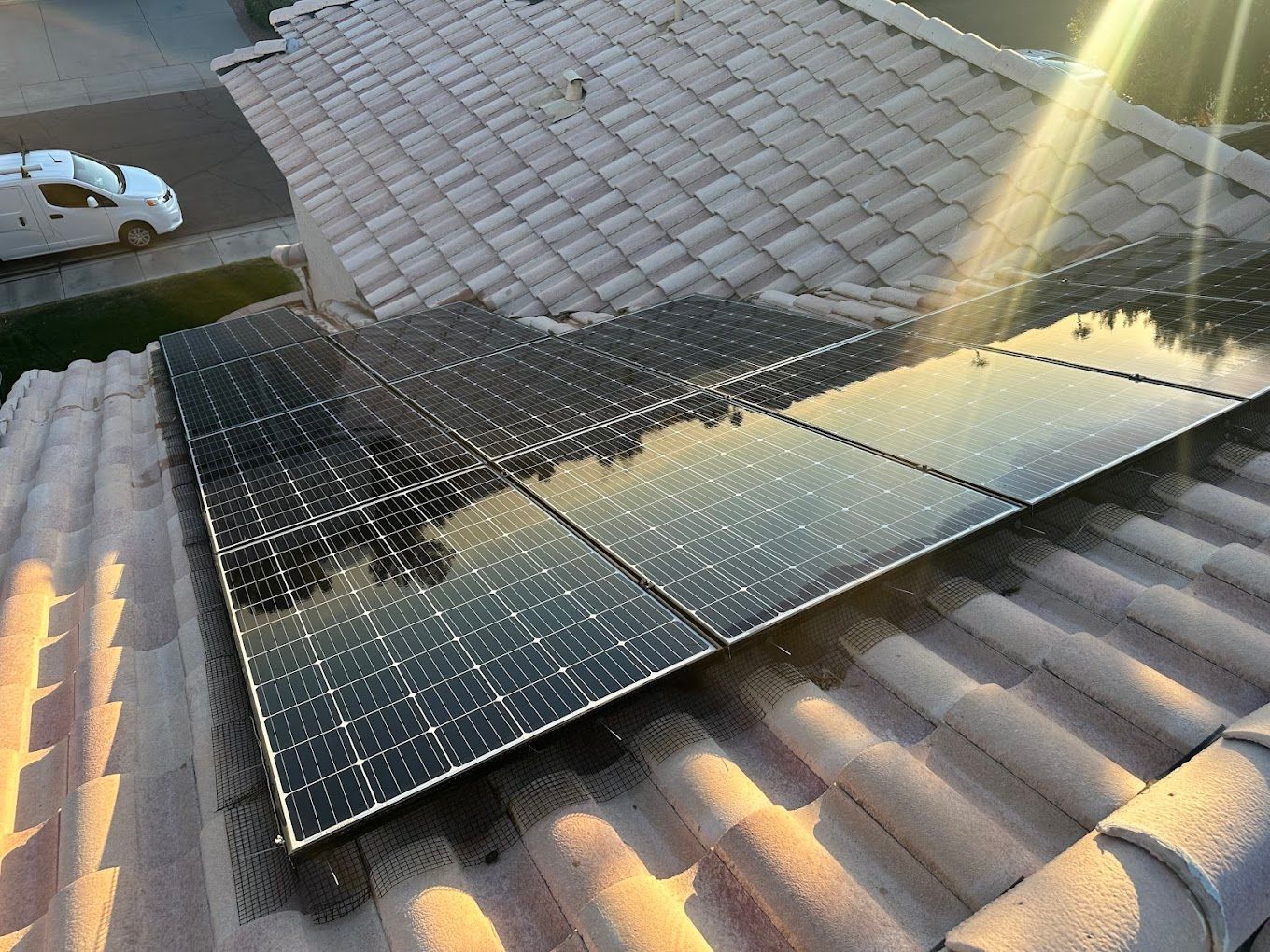 A roof with a lot of solar panels on it