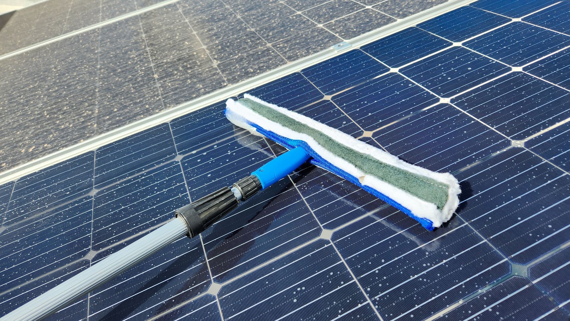 A roof with a lot of solar panels on it