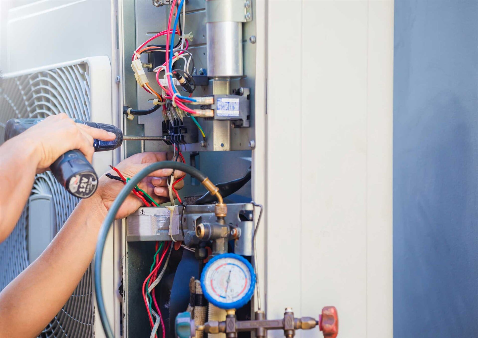 Repairing Air Conditioner — Electrician in Tinana, QLD