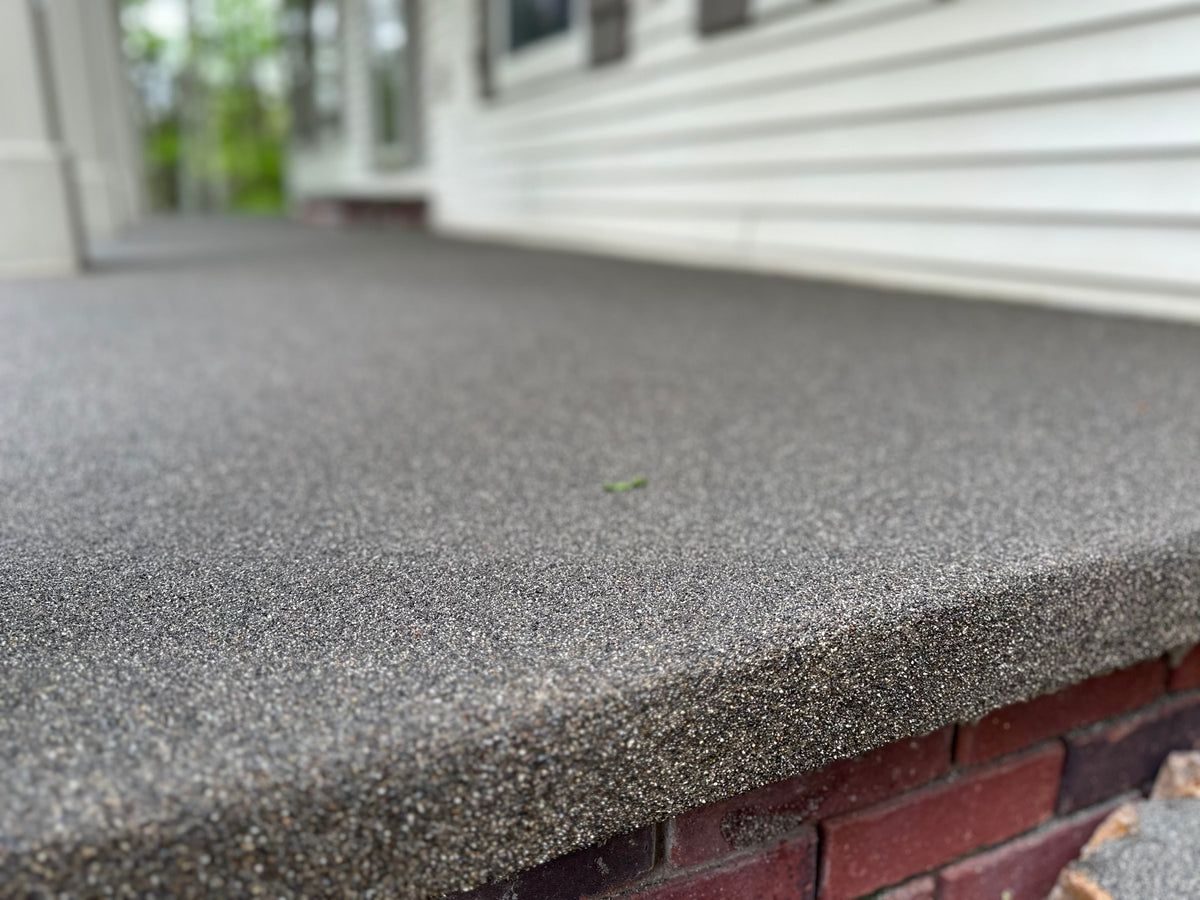 A large indoor swimming pool with a clear roof.