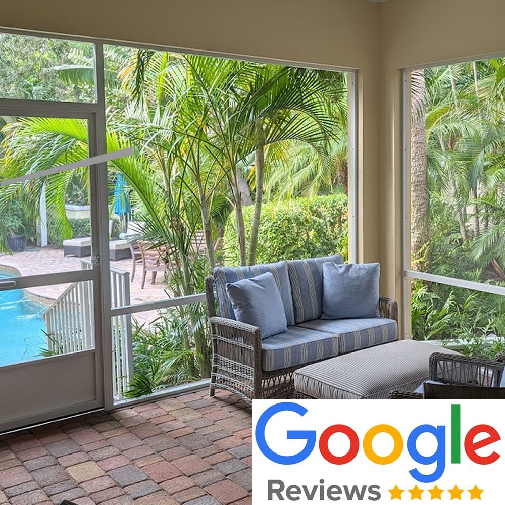 A screened in porch with a swimming pool in the background