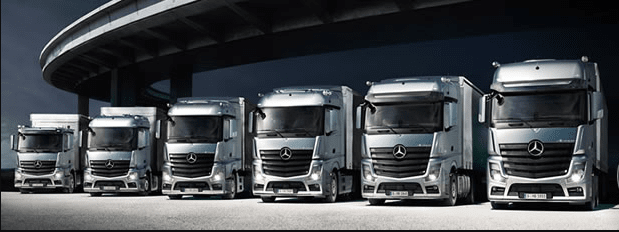 Mercedes Benz trucks lined up for repairs and services