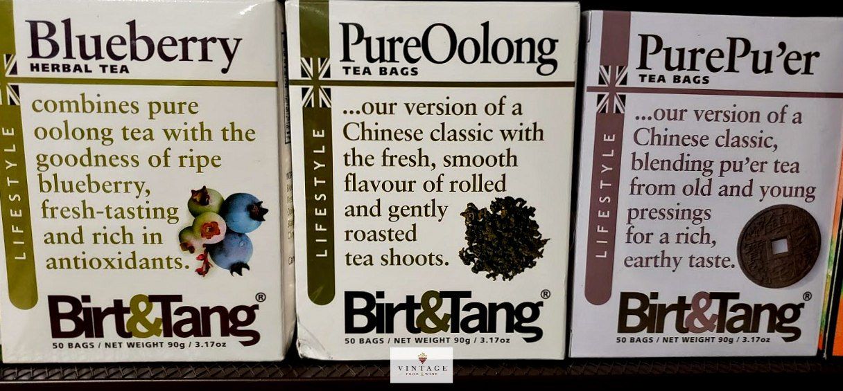 Tres cajas de té puro oolong y purepure de arándanos Birt & Tang