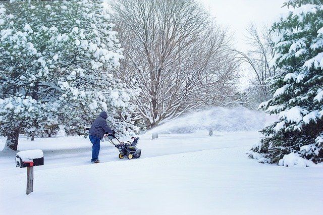 Driveway snow blowing