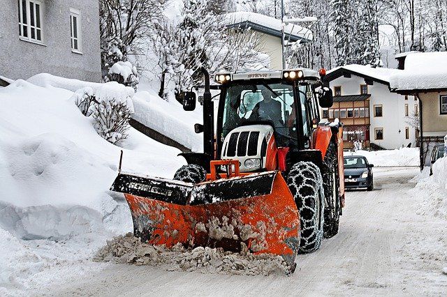 Snow plowing road