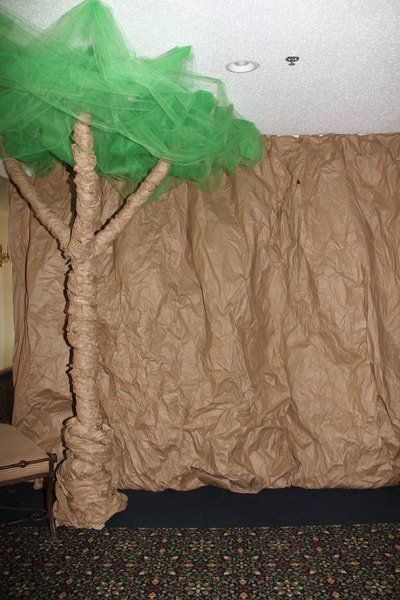 VBS room decoration of tree and rock wall