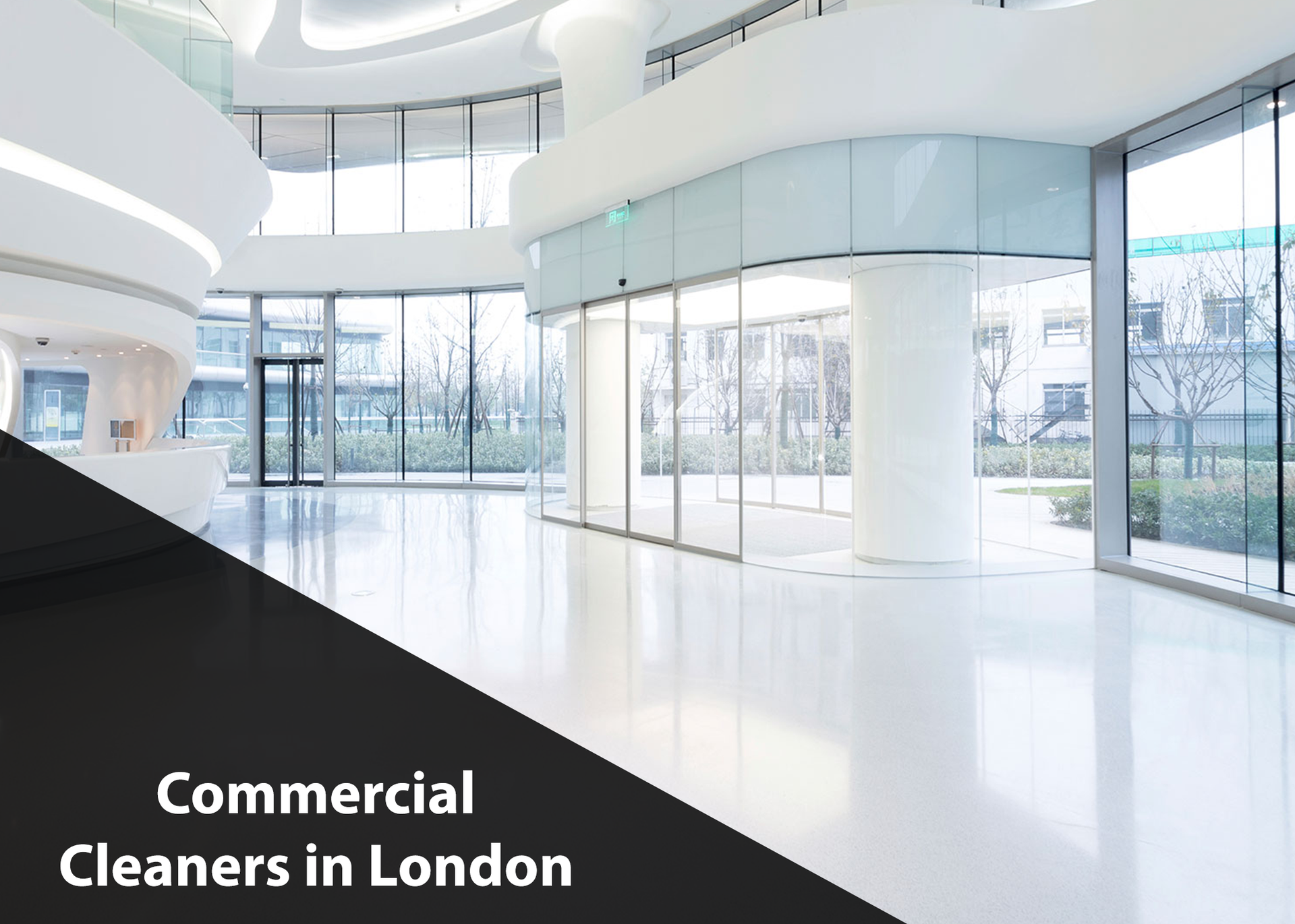 A large empty room with a lot of windows and a sign that says commercial cleaners in london.