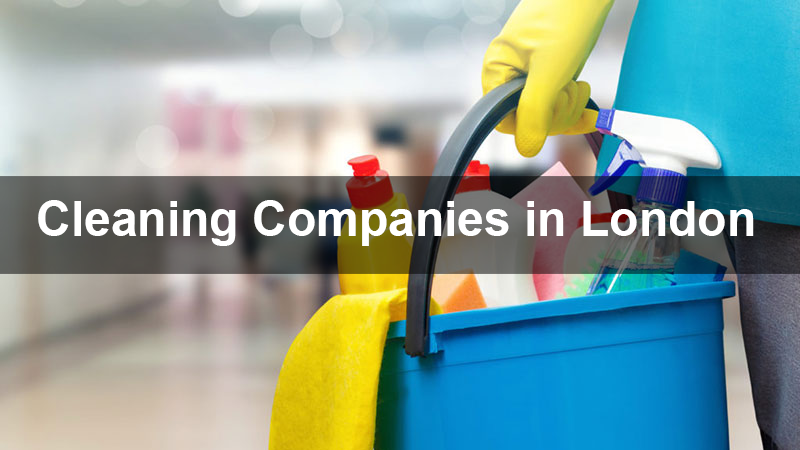 A cleaning company in london is holding a bucket of cleaning supplies.