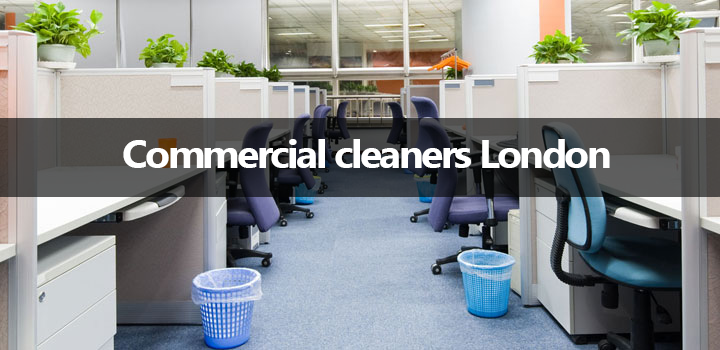 An office with cubicles and chairs and a sign that says commercial cleaners london