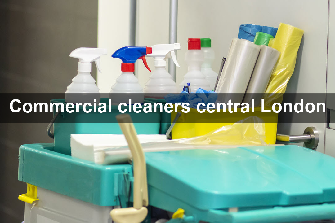 A cart filled with cleaning supplies and a sign that says commercial cleaners central london