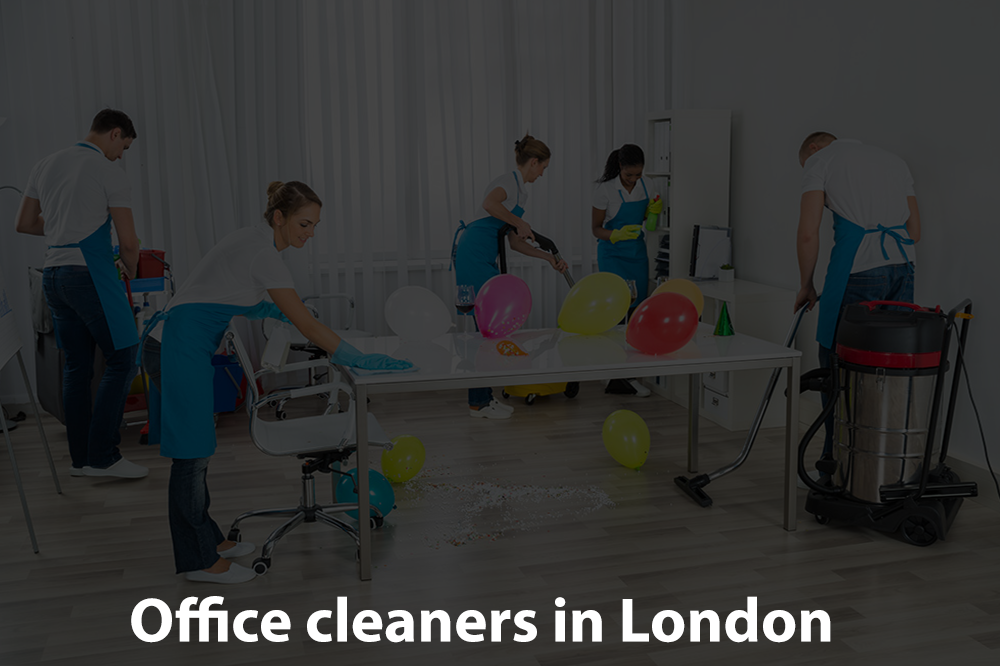 A group of office cleaners are cleaning an office with balloons.