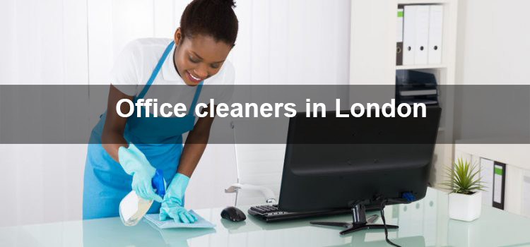 A woman is cleaning an office desk with a mop.