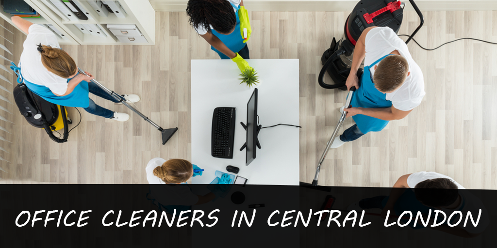 A group of office cleaners are cleaning an office in central london.