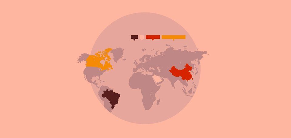 Una mappa del mondo con un cerchio attorno su sfondo rosa.