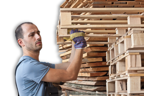 Man Arranging Pallets — Plant City, FL — WW Pallets, Inc.