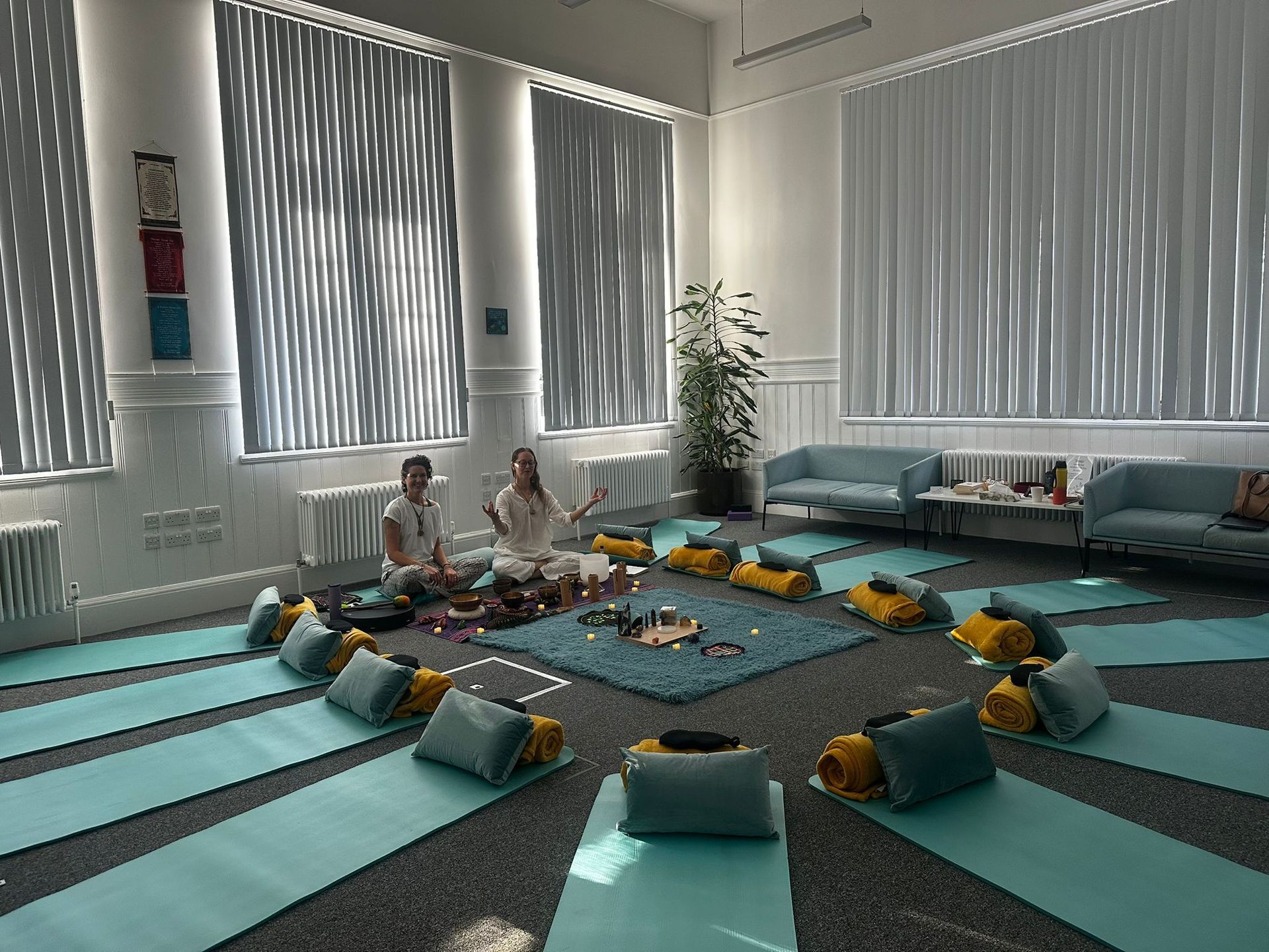 Yoga mats in a circle ready for a breathwork class
