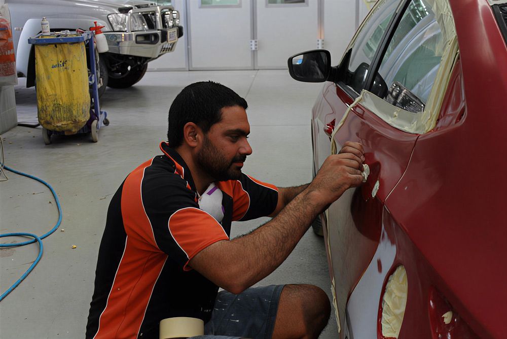 A Panel Beater At Work In Darwin