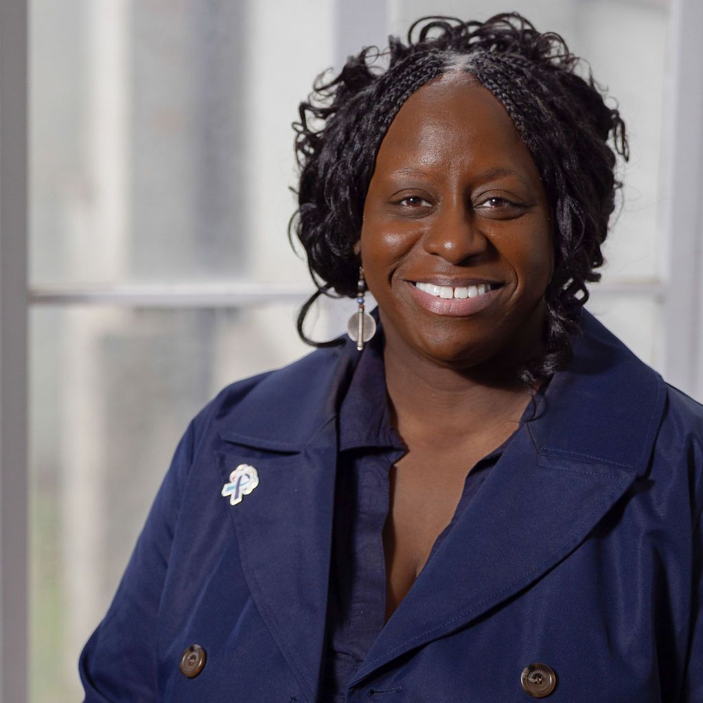 A man in a suit and tie without a face