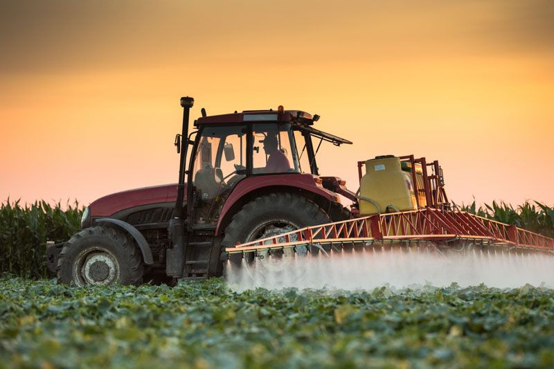 Tractor spraying