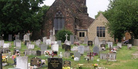 Headstones and memorials in a churchyard cemetery