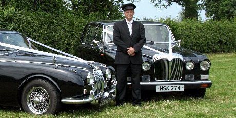 A black Jaguar wedding car