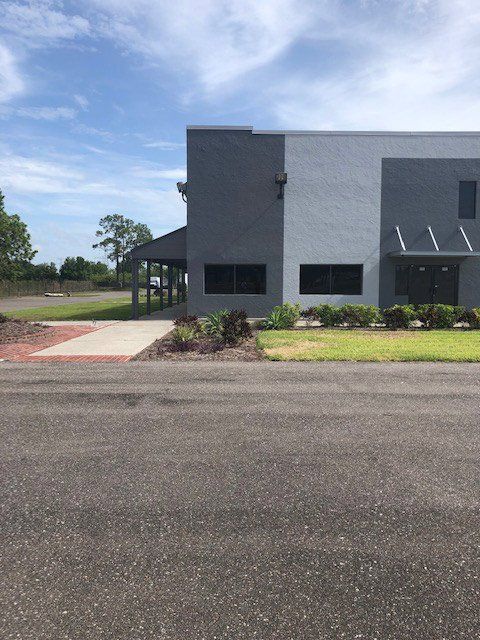 Gray building across the road — Largo, FL — England Bros Construction