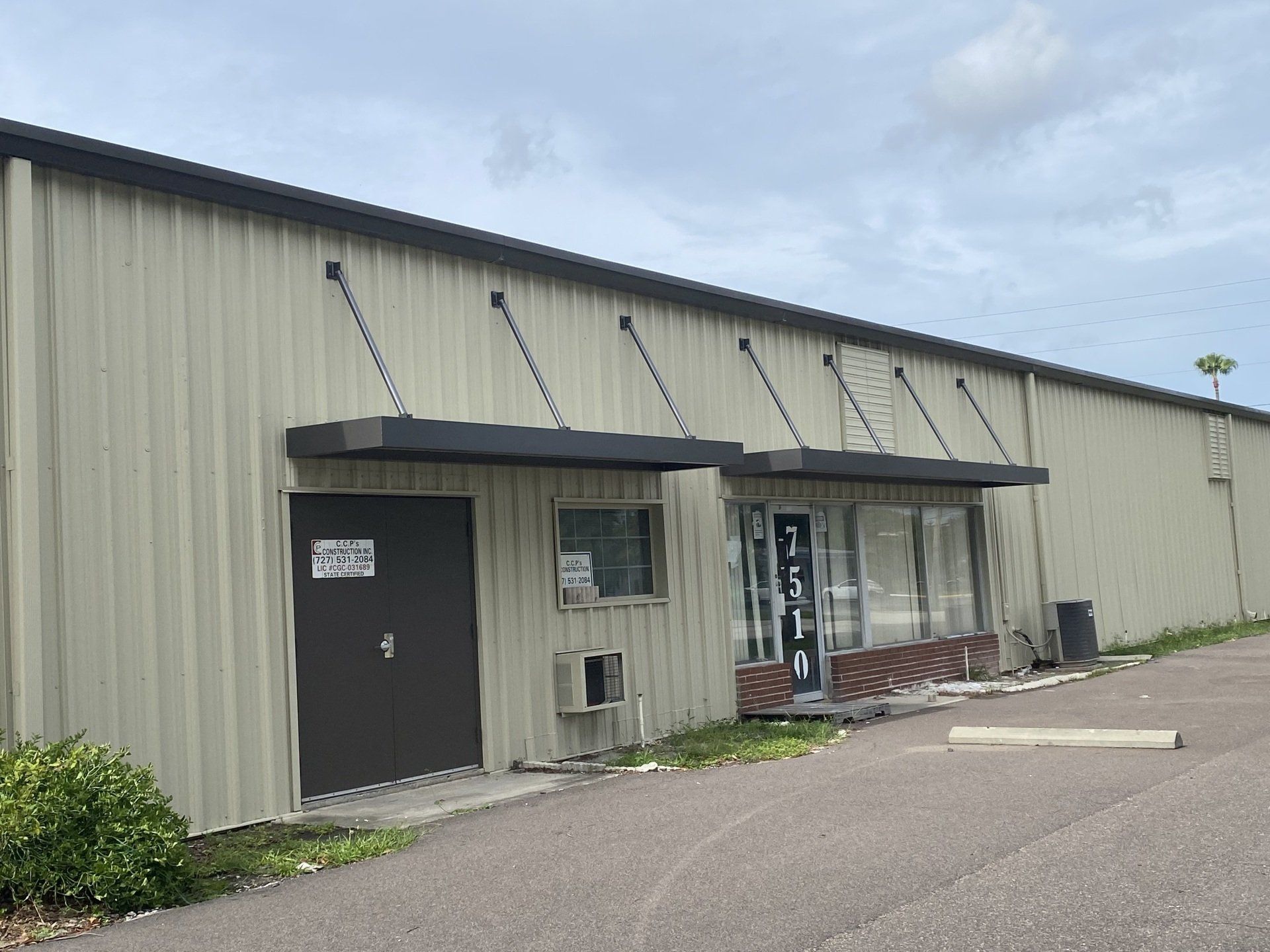 Newly installed front store roof — Largo, FL — England Bros Construction