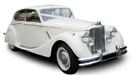 A white vintage car with white tires on a white background.