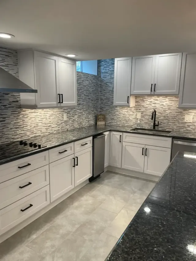 Custom Kitchen Renovation with White Cabinetry and Tile Backsplash
