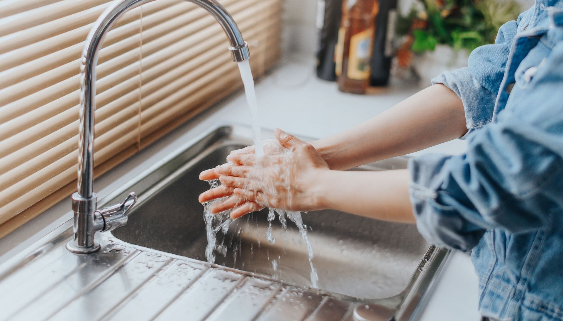 two men standing next to each other with their arms crossed