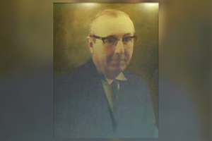 A painting of a man in a suit and tie with glasses.