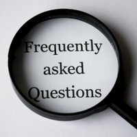 Magnifying glass highlighting the words “Frequently asked Questions” on a white background