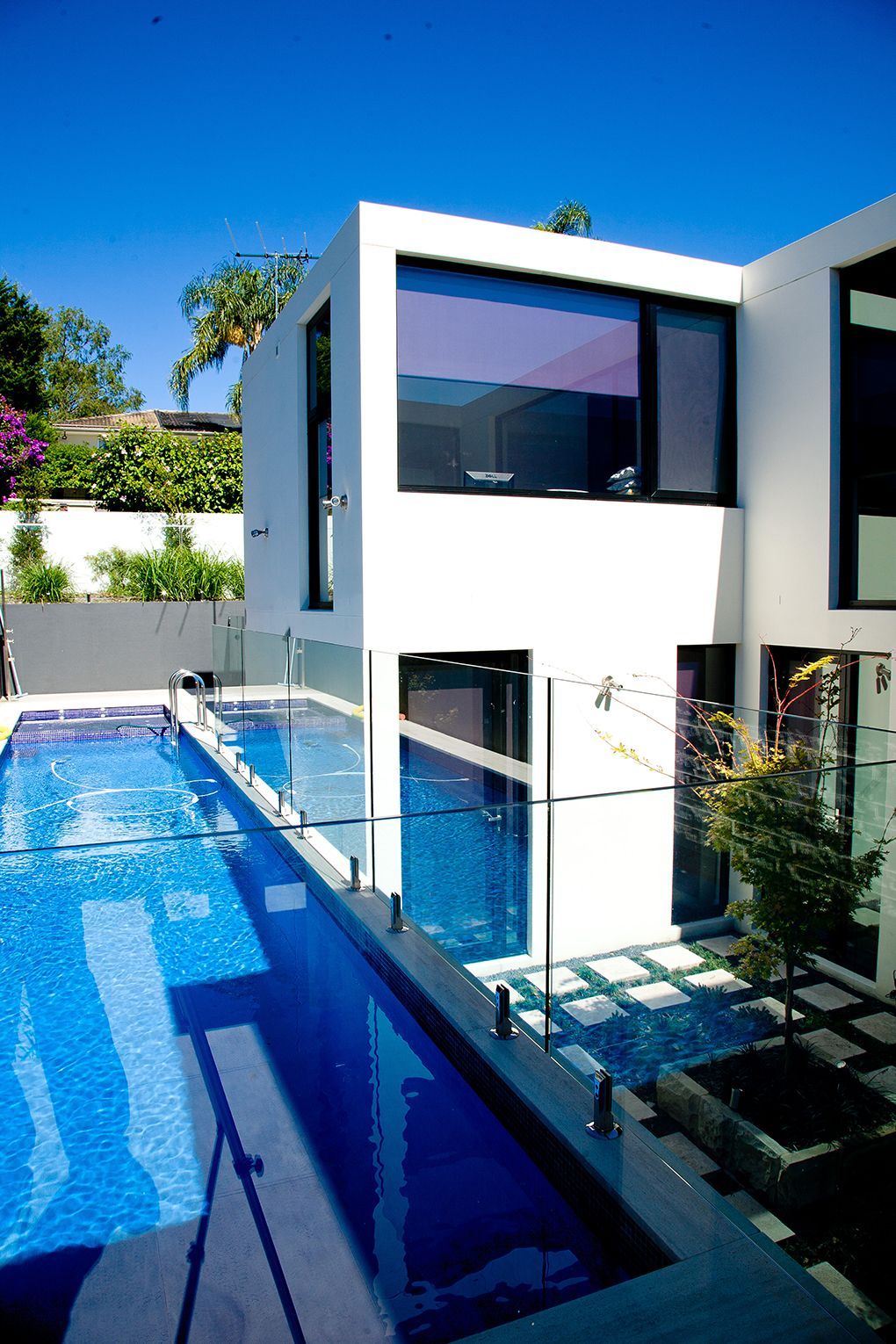 Modern White House With a Long Blue Pool, Glass Fence — Burmah Constructions In Kangaroo Valley, NSW