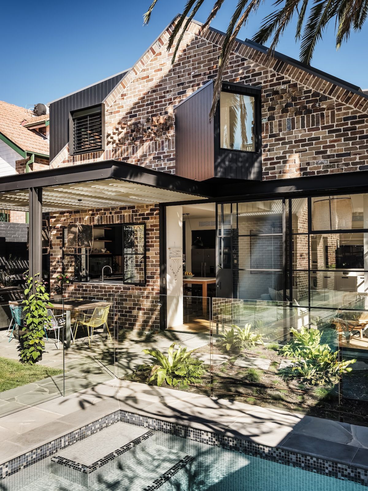 Brick House With a Patio, Pool, and Plants. Sunny Outdoor Setting — Burmah Constructions In Kangaroo Valley, NSW