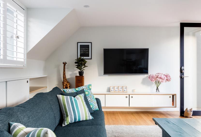 Living Room With a Blue Sofa, Tv, and White Built-in Storage — Burmah Constructions In Kangaroo Valley, NSW