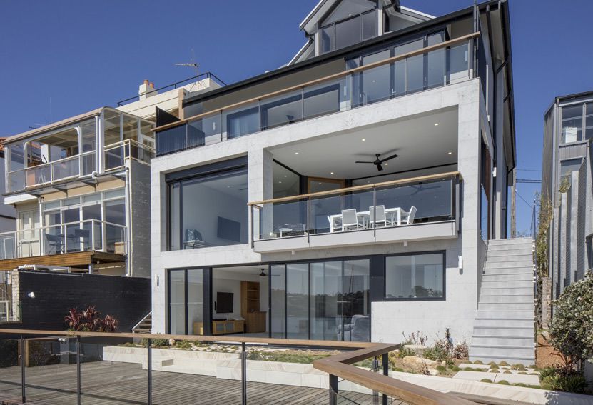 Modern Multi-story Beach House With Glass Balconies and Stairs Leading Up — Burmah Constructions In Kangaroo Valley, NSW