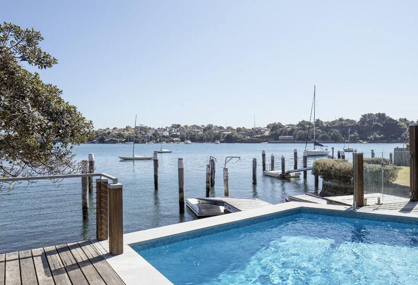 Poolside View of Harbor With Boats, Blue Water, and Clear Sky — Burmah Constructions In Kangaroo Valley, NSW