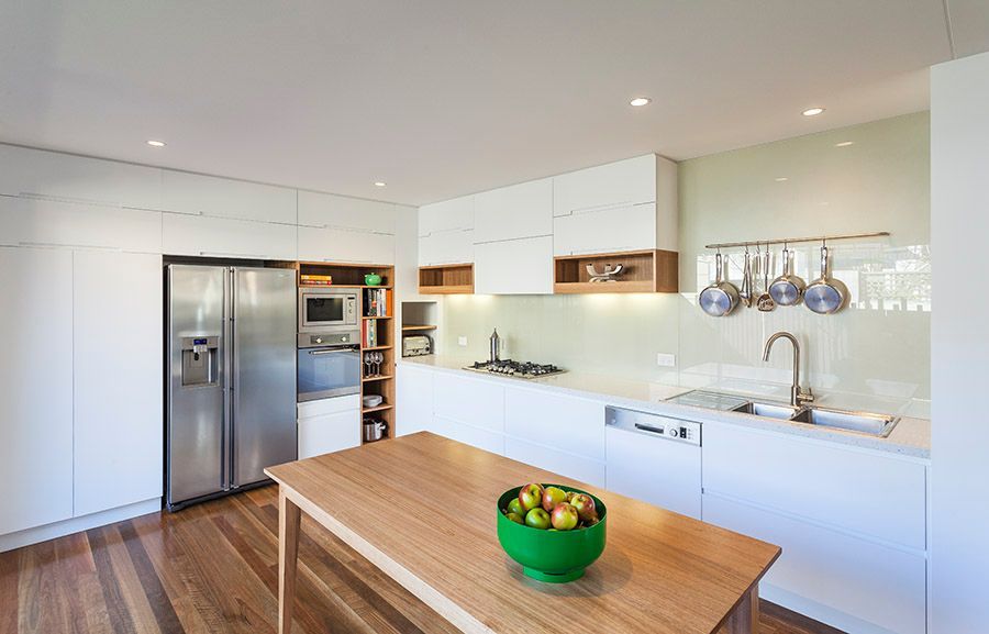 Modern White Kitchen With Stainless Steel Appliances — Burmah Constructions In Kangaroo Valley, NSW