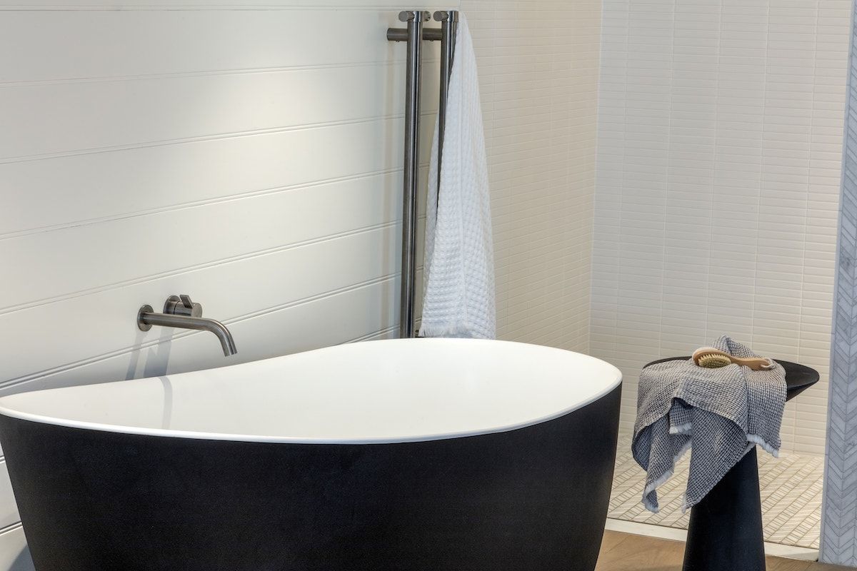 Black Bathtub in a White Bathroom — Burmah Constructions In Kangaroo Valley, NSW
