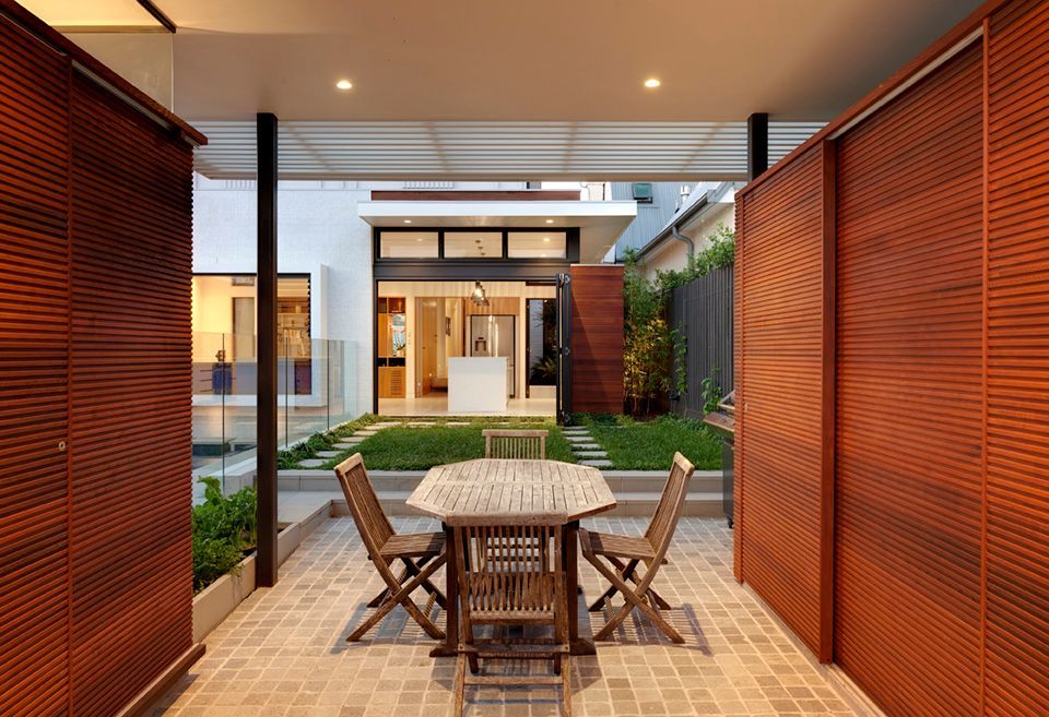 Outdoor Dining Area With Wooden Table and Chairs — Burmah Constructions In Kangaroo Valley, NSW