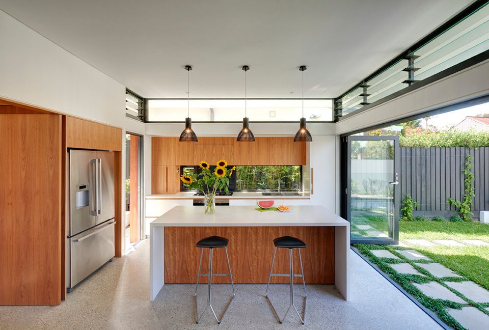 Modern Kitchen With Wood Cabinets, Island, and Window to a Backyard — Burmah Constructions In Kangaroo Valley, NSW