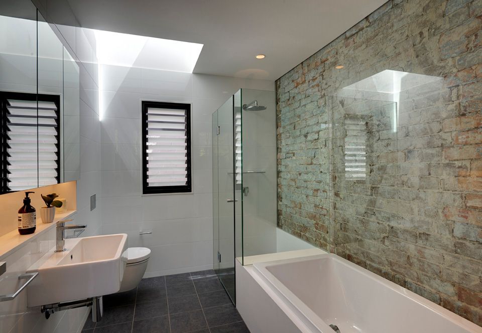 Modern Bathroom With Exposed Brick Wall, White Tub — Burmah Constructions In Kangaroo Valley, NSW