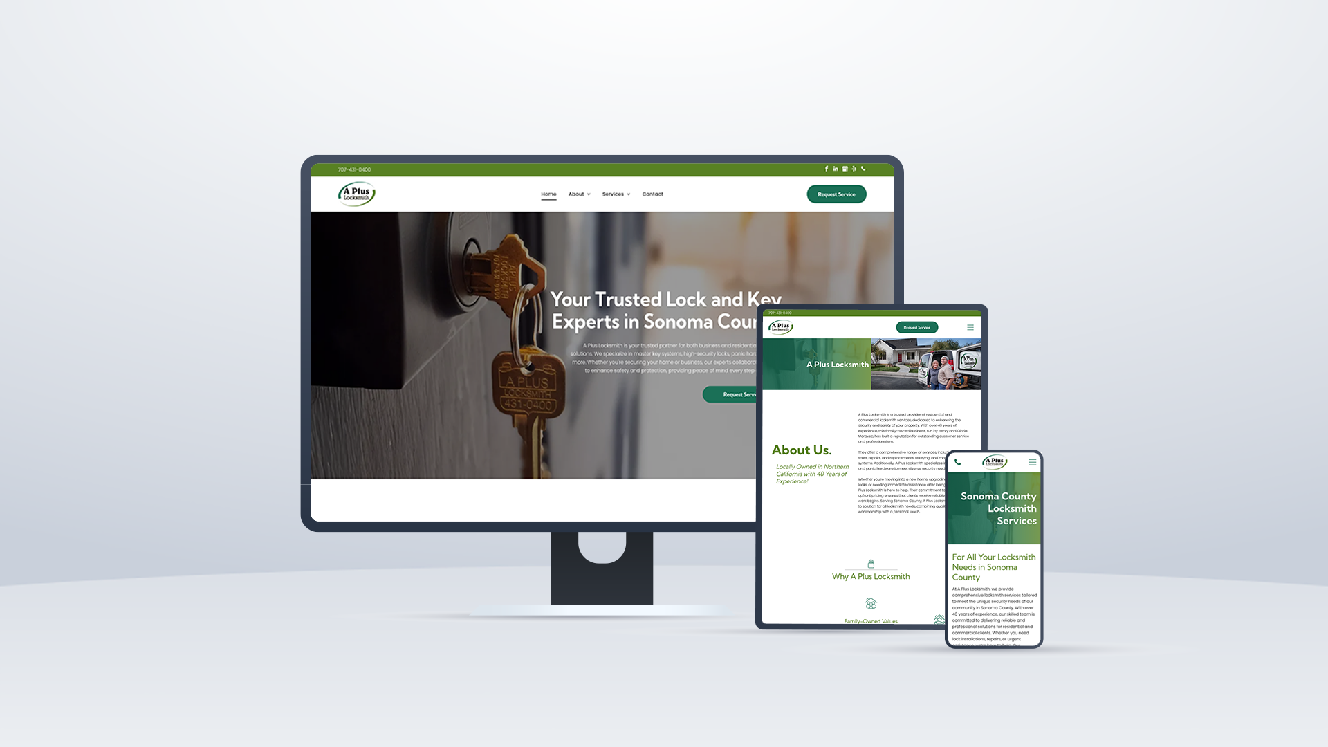 A computer monitor a tablet and a cell phone are displaying a website for a lock and key company.