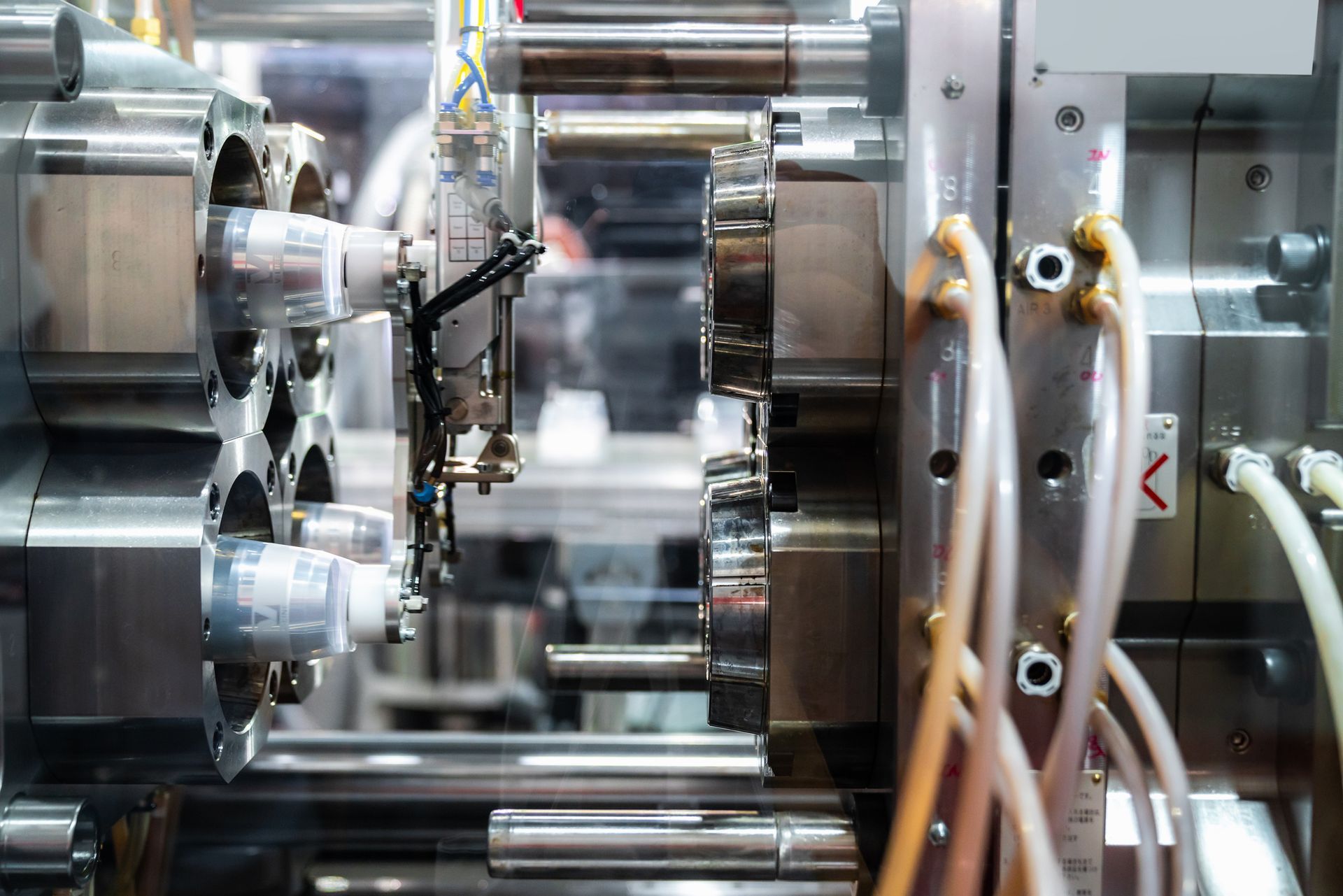 Plastic Injection Molding Machine in A Factory — Madisonville, KY — Wil-Mar Hydraulics & Machine Inc.
