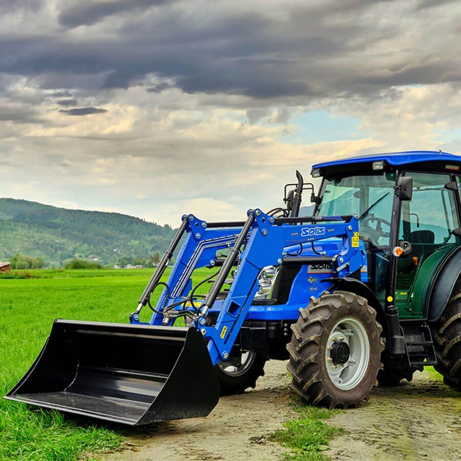 Front loader on a farm — Thompson's Farm Gear In Wauchope, NSW