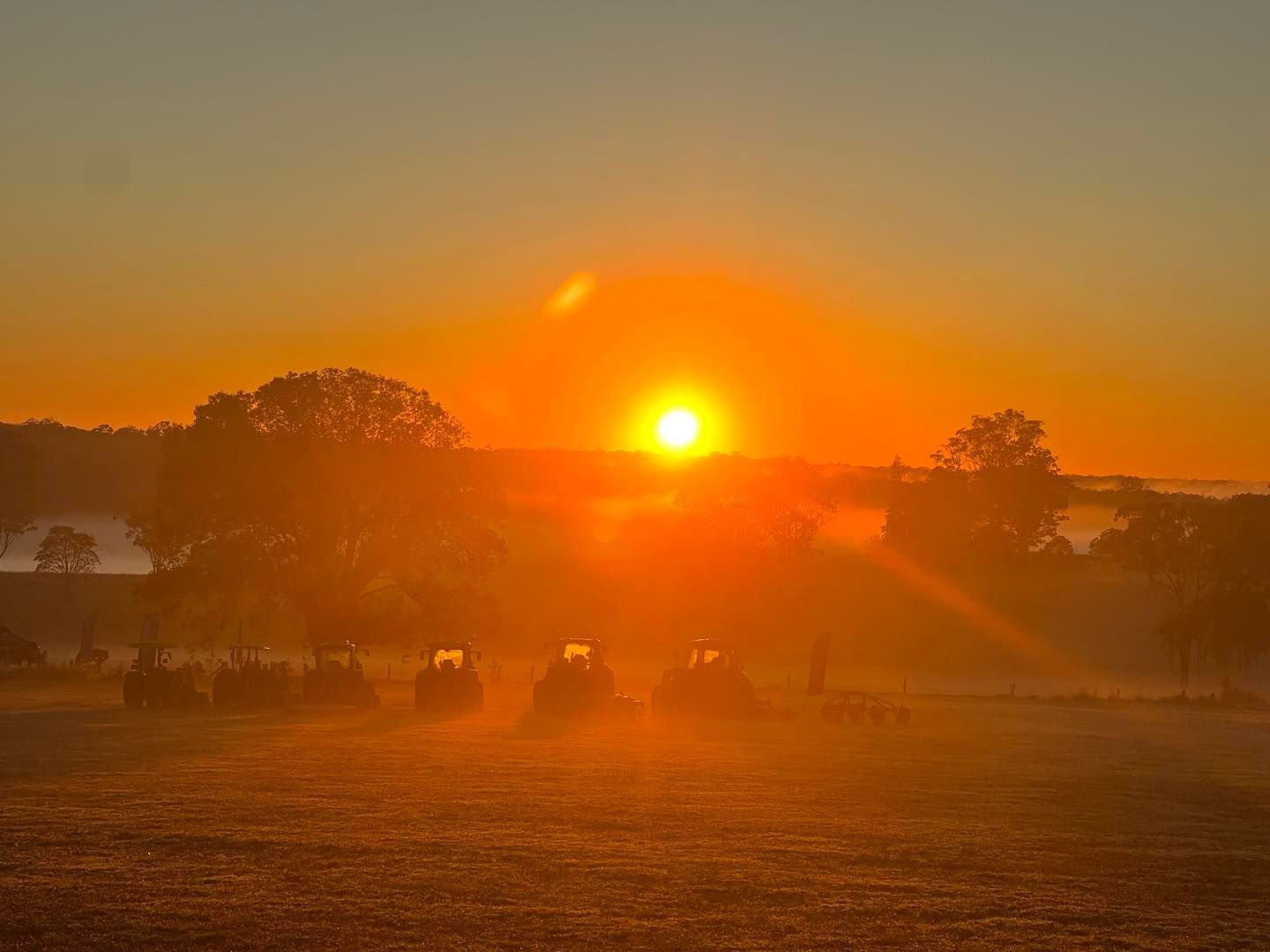 Farm Machinery Tractor in the Warm Glow of Sunset — Thompson's Farm Gear In Wingham, NSW