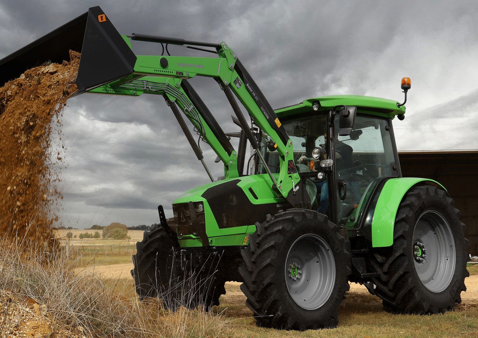 Deutz Fahr Tractor in a Farm Setting — Thompson's Farm Gear In Wauchope, NSW