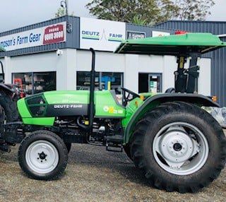 Green Tractor in Front of the Shop — Thompson's Farm Gear In Wauchope, NSW
