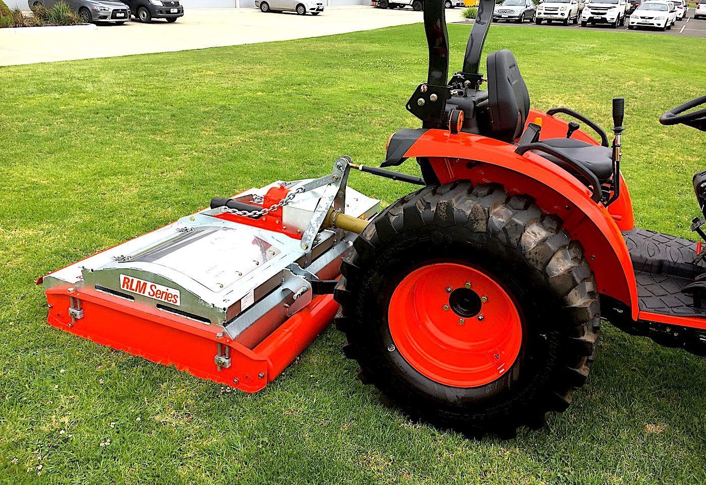 Tractor Speeding Across the Field — Thompson's Farm Gear In Coffs Harbour, NSW